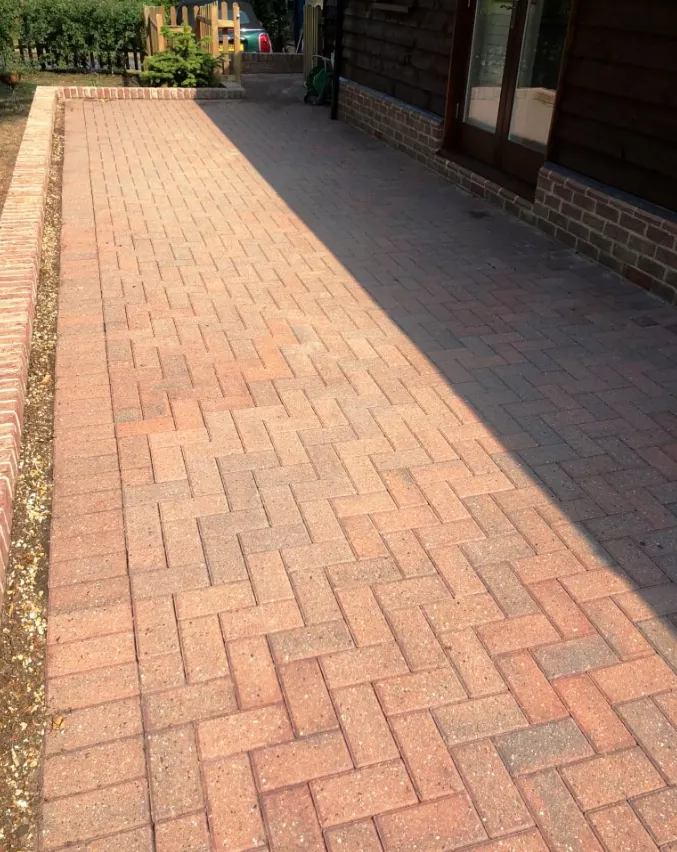 Block paved patio in a Farnham garden